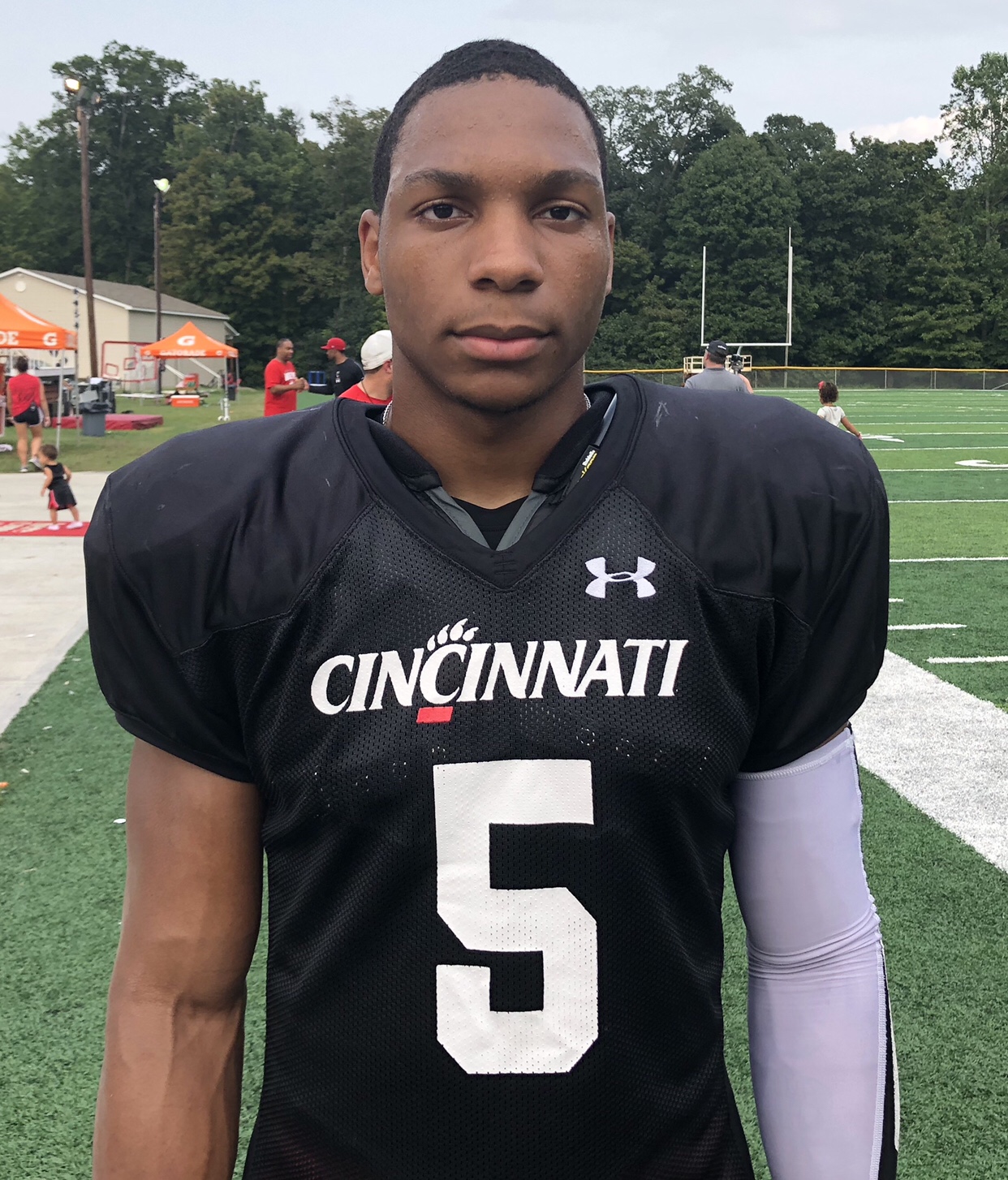 J.T. speaks with sophomore safety Darrick Forrest after scrimmage